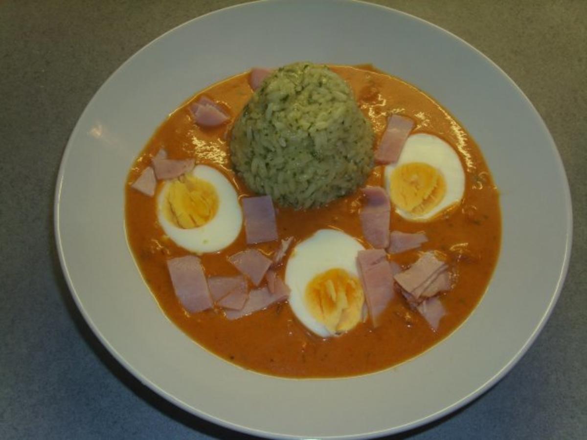 Tellergerichte: Eier in Tomatensosse und Kräuterreis - Rezept - kochbar.de