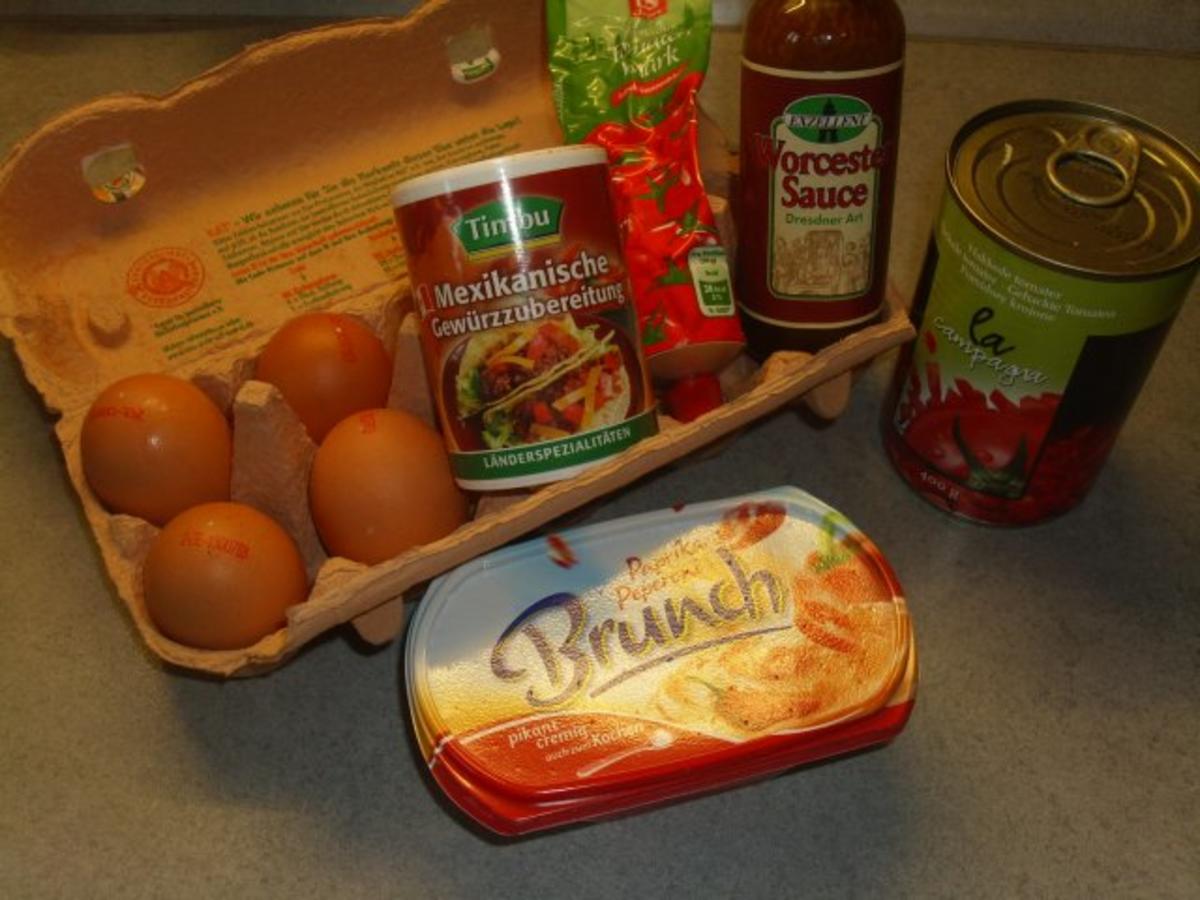 Tellergerichte: Eier in Tomatensosse und Kräuterreis - Rezept - Bild Nr. 2