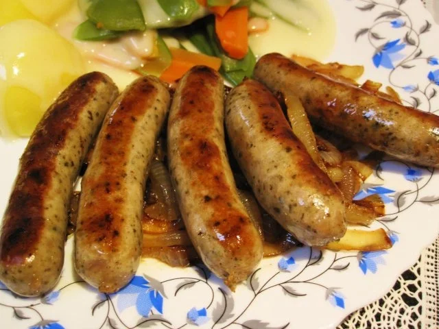 Nürnberger Würstchen mit viel Zwiebeln - Rezept