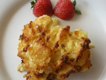 Kassler versteckt sich unter Röstis und Ananas - Rezept