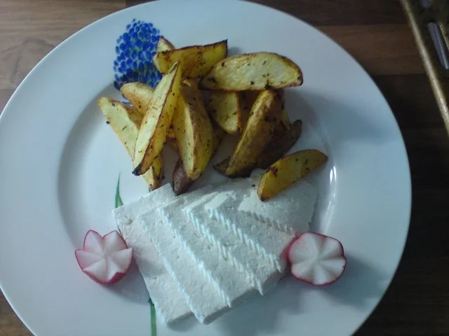 Rezept: Kartoffelspalten mit Ziegen- Feta Kartoffelspalten mit Ziegen- Feta - Rezept