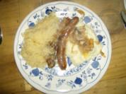 Schweinswürstl mit Sauerkraut und Kartoffelbrei - Rezept