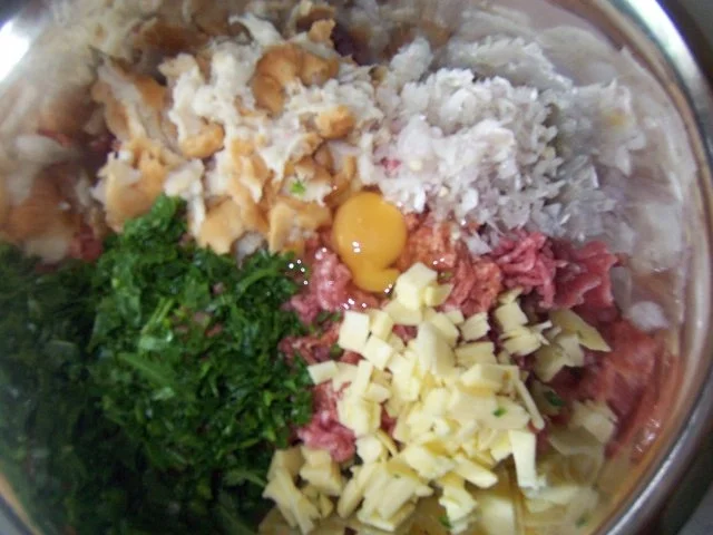 Rezept: Rucola-Bällchen auf Tomatensauce Bild Nr. 2 Rucola-Bällchen auf Tomatensauce - Rezept - Bild Nr. 2