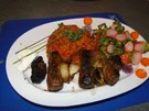 Djuwetschreis mit Cevapcici - Rezept
