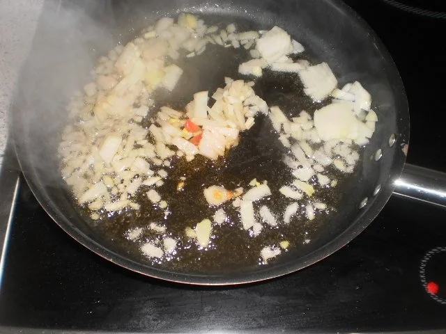 Gefüllte Paprikaschote mit Tomatenreis und Hack - Rezept - Bild Nr. 3