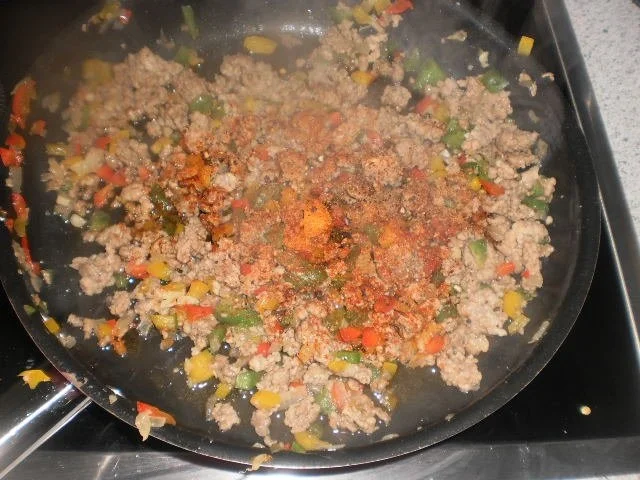 Gefüllte Paprikaschote mit Tomatenreis und Hack - Rezept - Bild Nr. 9