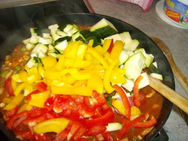 Kunterbuntes Reispfännchen mit Hähnchenbrust - Rezept - Bild Nr. 6