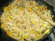 Kunterbuntes Reispfännchen mit Hähnchenbrust - Rezept