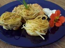 Spaghetti-Nester mit Zuchini-Frischkäse-Sauce - Rezept