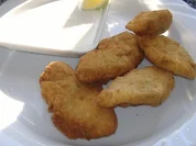 Kräuterbackhendel mit Zitronendip - Rezept