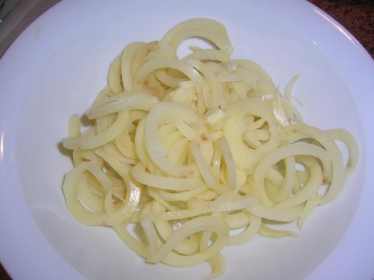 Stielkotelett mit Kapern und Sardellen, an geschmorten Tomaten mit Twister Kartoffeln - Rezept - Bild Nr. 7