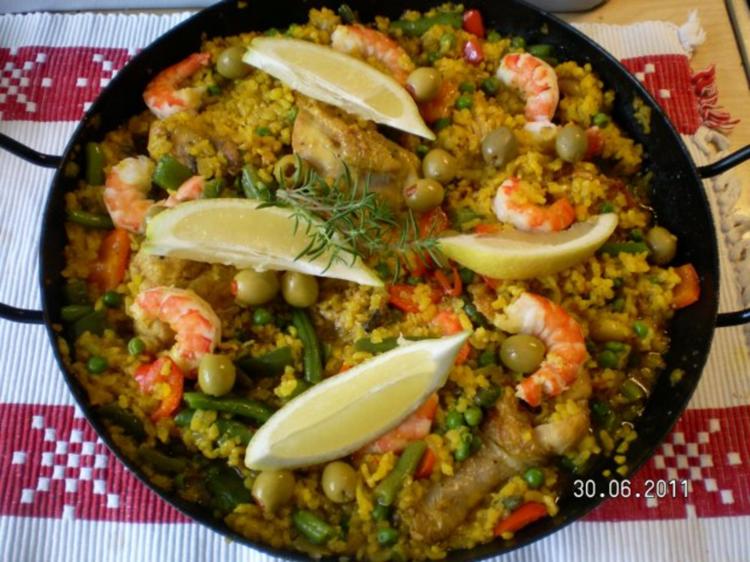 Paella mit Hähnchen und Meeresfrüchte - Rezept - kochbar.de