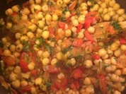 Kichererbsen in pikanter Tomatensoße zu Reis - Rezept