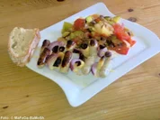 Bratwurst-Spießchen auf Sommergemüse - Rezept