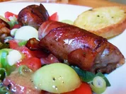 Rezept: Rinderhack im Speckmantel auf Salat mit Melonendressing Rinderhack im Speckmantel auf Salat mit Melonendressing - Rezept