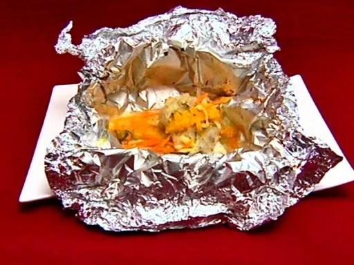 Fisch mit Tomaten, Karotten und Fenchel, Orangenfilets und Petersilienkartoffeln - Rezept