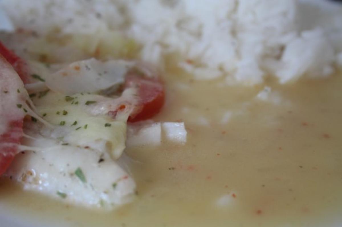 Zander-Tomaten-Gratin an Butter-Zwiebel-Soße und Reis - Rezept - kochbar.de