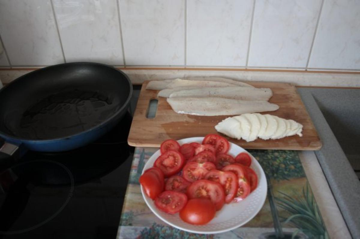 Zander-Tomaten-Gratin an Butter-Zwiebel-Soße und Reis - Rezept - Bild Nr. 3