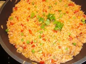 Reis nach Djuvec-Art mit Cevapcici - Rezept