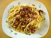 Spaghetti mit Pfifferlingen und Schinken - Rezept