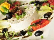 Ziegenkäse mit Oliven-Kürbiskernöl-Dressing - Rezept