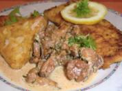 Putenschnitzel mit Parmesankruste und  Pfifferlingen mit Röstis - Rezept