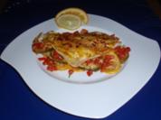 Schollenfilets mit Senf-Käse-Haube auf Zucchini-Tomaten-Gemüse - Rezept