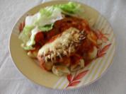 Hühnebrustfilet in Tomaten-Lauchsoße mit Käse überbacken - Rezept