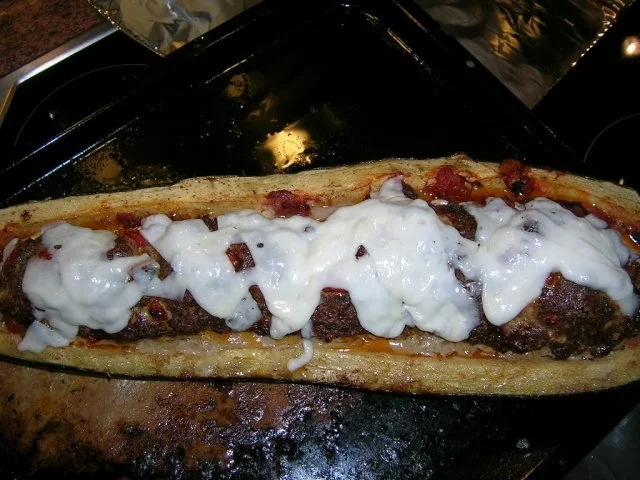 Rezept: XXXL-Zucchini, ( 1 1/2 kg) gefüllt mit Lammhack und überbacken mit Ziegenkäse Bild Nr. 9 XXXL-Zucchini, ( 1 1/2 kg) gefüllt mit Lammhack und überbacken mit Ziegenkäse - Rezept - Bild Nr. 9