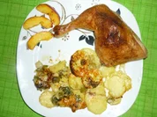 Gebackene Hähnchenkeulen auf Kartoffeln - Rezept