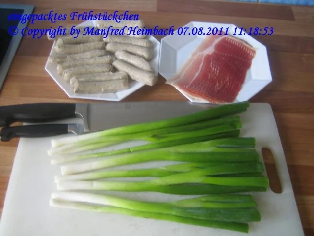 Rezept: Brunch – eingepackte Bratwürste und Frühlingszwiebeln Bild Nr. 3 Brunch – eingepackte Bratwürste und Frühlingszwiebeln - Rezept - Bild Nr. 3