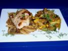 Rotbarsch natur auf Zwiebel-Champignonsoße und Zucchinigemüse - Rezept