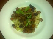 Reste-Ragout in Rotweinsauce auf Persischem Knusperreis - Rezept