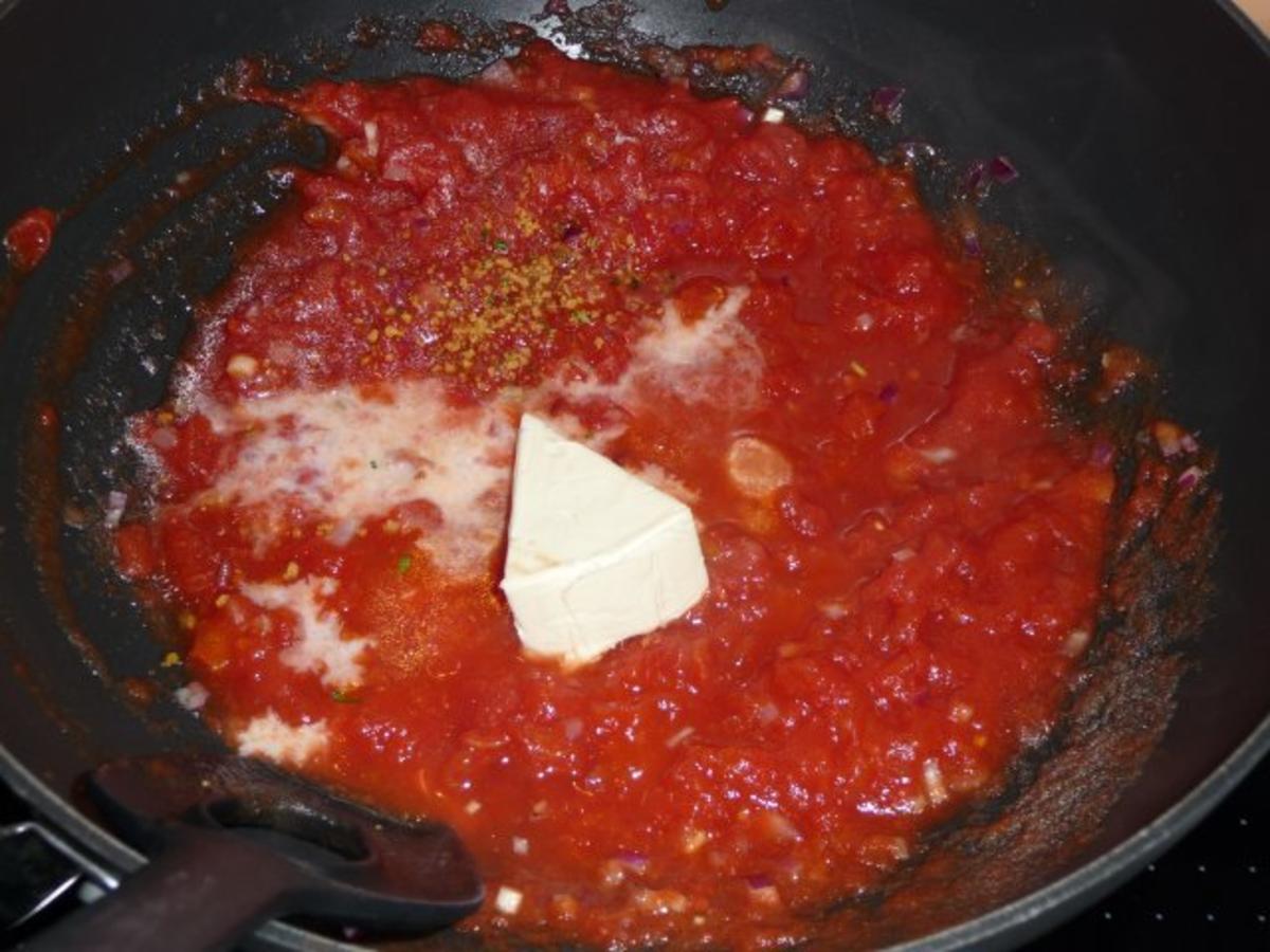 Hühnerbruströllchen mit Tomatenreis - Rezept - Bild Nr. 3