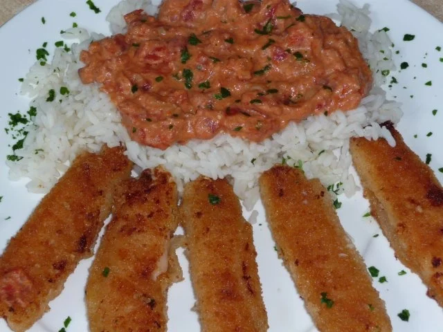 Hühnerbruströllchen mit Tomatenreis - Rezept