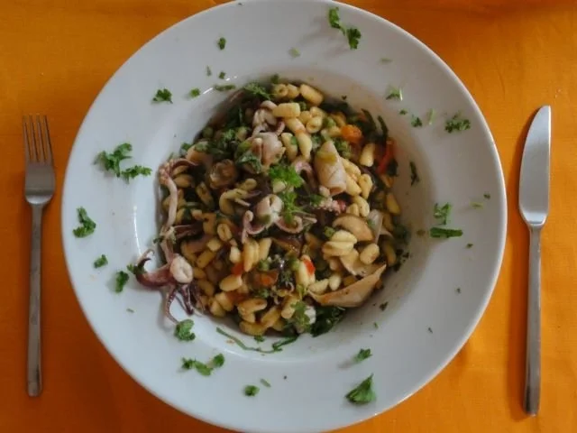 Gnochettini mit Tintenfischchen - Rezept