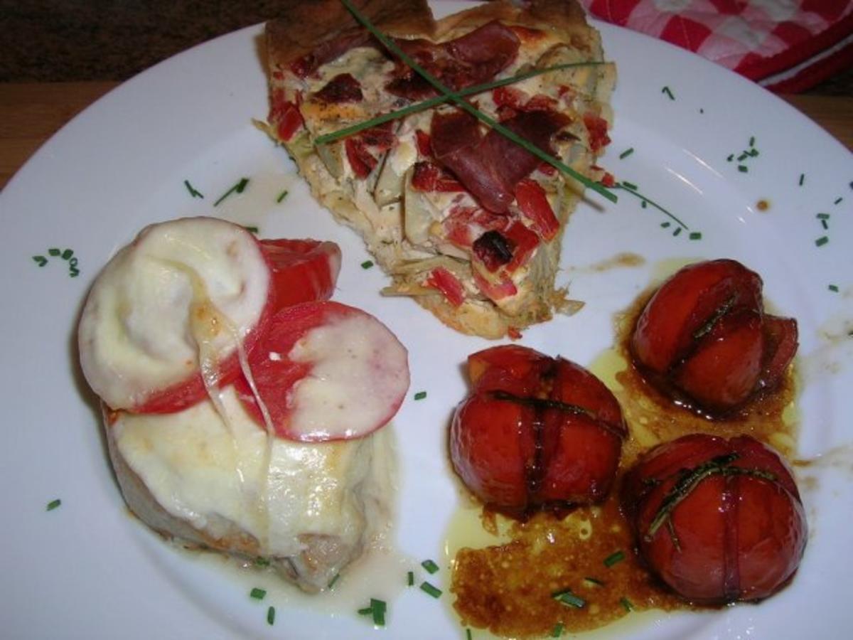 Bilder für Schweinesteak überbacken mit geschmorten Tomaten (meine schnelle Feierabendküche) - Rezept