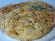 ital. Fladenbrot mit getr. Tomaten und Oliven - Rezept