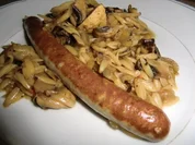 Champignon- Reisnudeln mit Putenbratwürstchen - Rezept