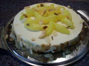 Rezept: Schmand-Sahnetorte mit Safran-Birnen Schmand-Sahnetorte mit Safran-Birnen - Rezept