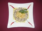 Hähnchenbrustfilet in Kokos-Cashew-Soße im Wildreis-Nest mit Zuckerschoten - Rezept