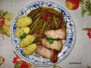 Schweinebraten auf Gemüsebett - Rezept