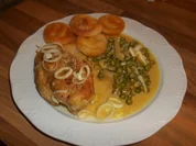 Scharfes Curryhuhn in Erbsen - Zwiebel - Sahnesauce - Rezept