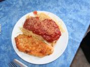 Putenschnitzel Parmigiana mit Tomatensauce - Rezept
