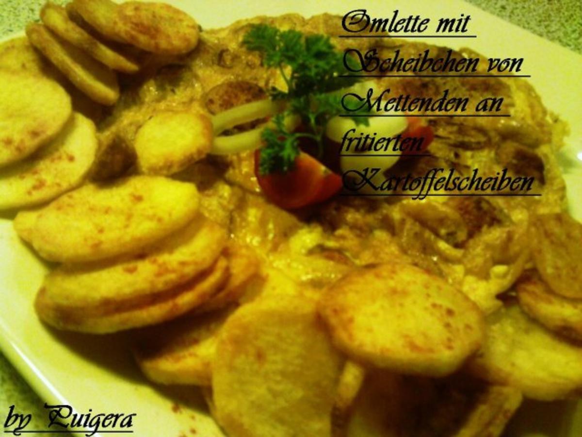 Omlett mit Scheibchen von Mettenden ,Zwiebeln und fritierten
Kartoffelscheiben - Rezept Eingereicht von puigera