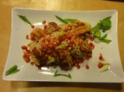 Risotto mit Speck und Granatapfelkernen - Rezept