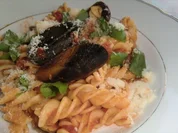 Spiralnudeln in einer Tomaten-Muschel-Soße - Rezept