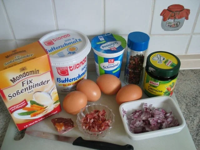 Eierspeisen: Eier in bunter Schinken-Pfeffer-Sahnesoße - Rezept