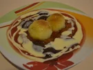 Rezept: Kartoffelknödel mit Pflaumen und Vanillesauce Kartoffelknödel mit Pflaumen und Vanillesauce - Rezept