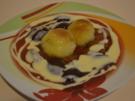 Kartoffelknödel mit Pflaumen und Vanillesauce - Rezept